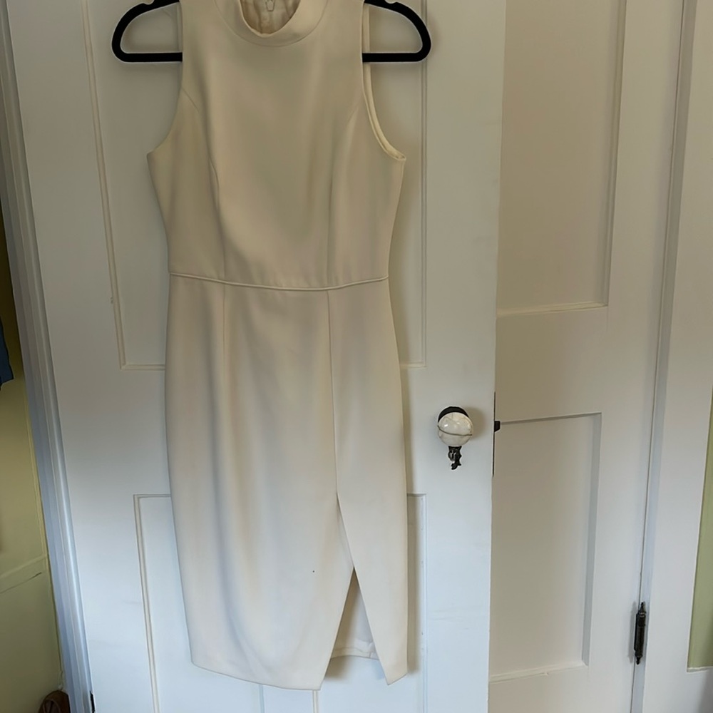 Exquisitely made and designed off white multi purpose dress!